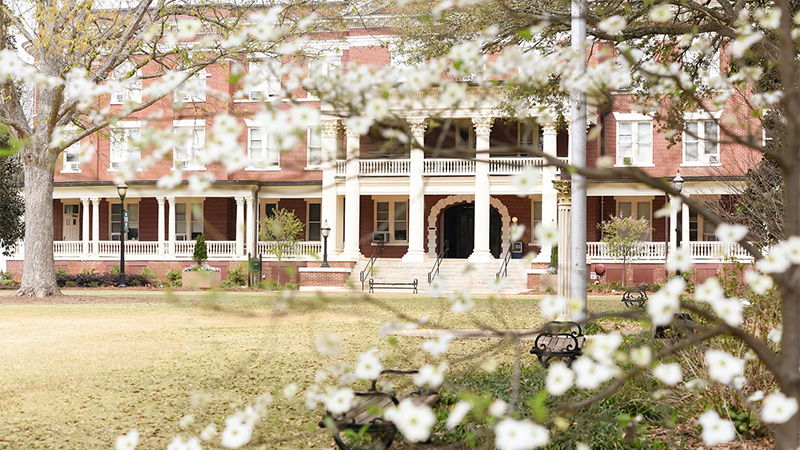 Outdoor photo of the front of campus in spring Outdoor photo of the front of campus in spring